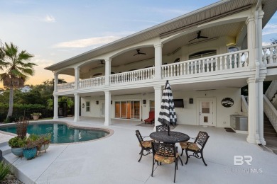 Stunning canal-front home on highly sought after Ono Island!