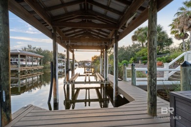 Stunning canal-front home on highly sought after Ono Island!