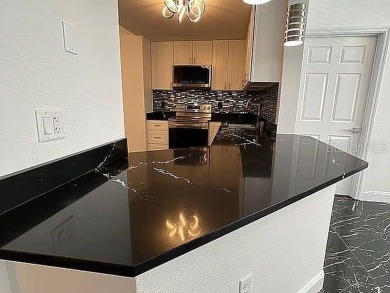 This condo was recently remodeled in a Tampa Bay Lightning theme