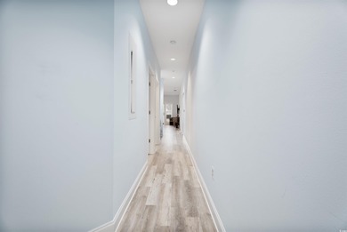 If you've been waiting for a fully renovated, first-floor condo