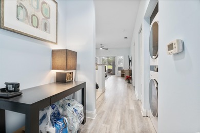 If you've been waiting for a fully renovated, first-floor condo