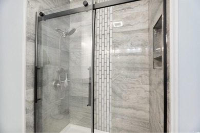 If you've been waiting for a fully renovated, first-floor condo