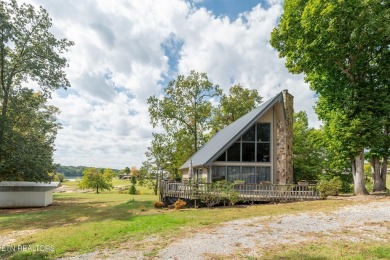 Charming WATERFRONT A-frame 3-bedroom, 2-bathroom, 1,536 sqft