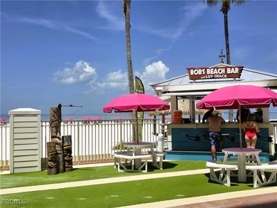 CAPTIVATING GULF VIEWS in upscale Resort beachfront condo with a