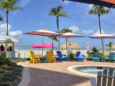 CAPTIVATING GULF VIEWS in upscale Resort beachfront condo with a