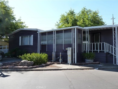WANT A SPACIOUS HOME with a lovely, tree-shaded yard? This