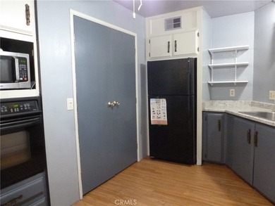 WANT A SPACIOUS HOME with a lovely, tree-shaded yard? This