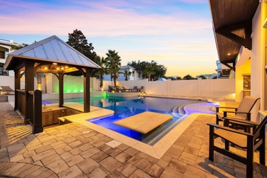 Sleek coastal contemporary design perfectly situated to capture