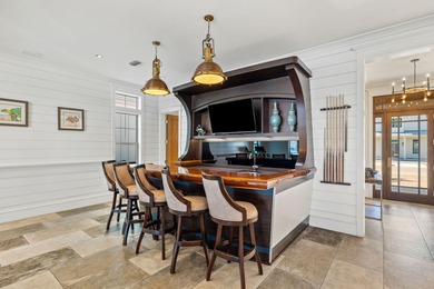 Sleek coastal contemporary design perfectly situated to capture