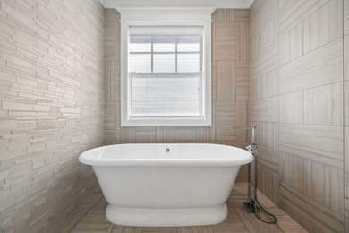 Sleek coastal contemporary design perfectly situated to capture