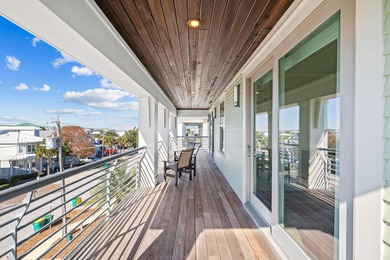 Sleek coastal contemporary design perfectly situated to capture