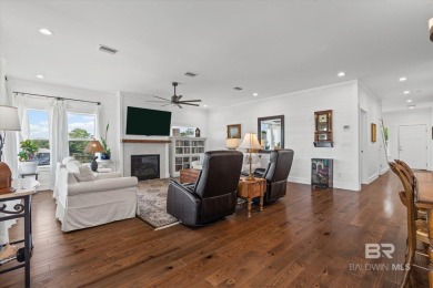 WATER FRONT LIVING DIRECTLY ON BON SECOUR RIVER! Custom built