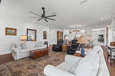 WATER FRONT LIVING DIRECTLY ON BON SECOUR RIVER! Custom built