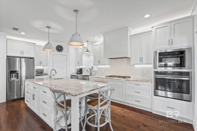 WATER FRONT LIVING DIRECTLY ON BON SECOUR RIVER! Custom built