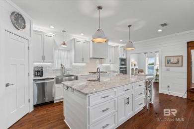 WATER FRONT LIVING DIRECTLY ON BON SECOUR RIVER! Custom built