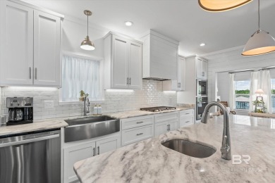 WATER FRONT LIVING DIRECTLY ON BON SECOUR RIVER! Custom built