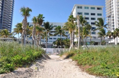 Oceanfront building close to shops and public transportation