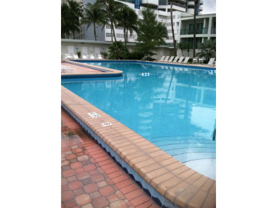 Oceanfront building close to shops and public transportation