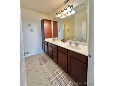 PRICED TO SELL! Experience the best of lakefront living at this