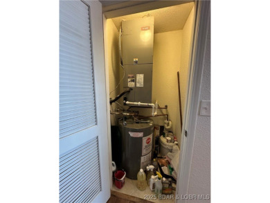 PRICED TO SELL! Experience the best of lakefront living at this