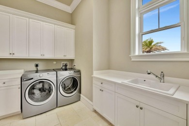 Experience the pinnacle of coastal living in this custom built