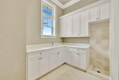 Experience the pinnacle of coastal living in this custom built