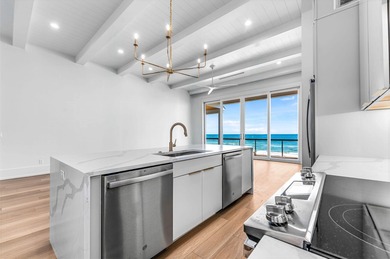 This new construction, six-bedroom, six-bathroom Gulf-front home