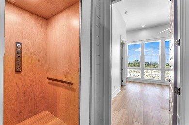 This new construction, six-bedroom, six-bathroom Gulf-front home