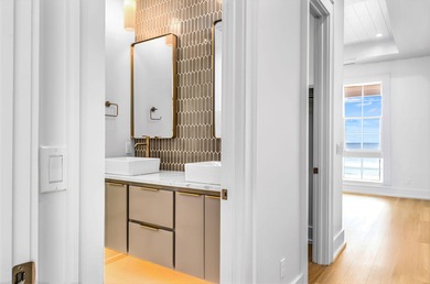 This new construction, six-bedroom, six-bathroom Gulf-front home