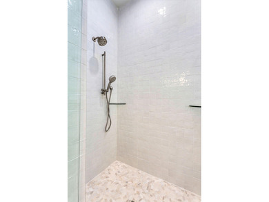 This new construction, six-bedroom, six-bathroom Gulf-front home