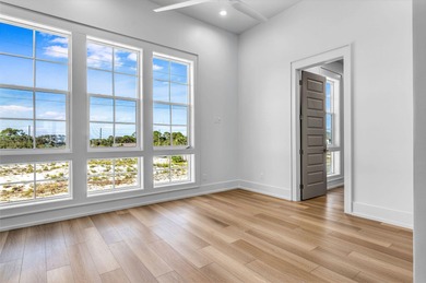 This new construction, six-bedroom, six-bathroom Gulf-front home