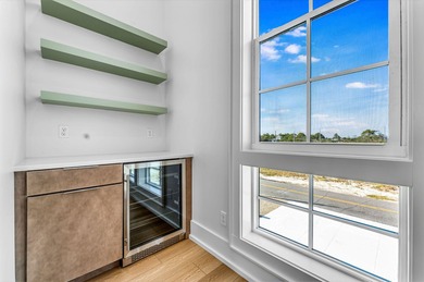 This new construction, six-bedroom, six-bathroom Gulf-front home