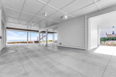 This new construction, six-bedroom, six-bathroom Gulf-front home