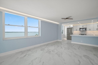CORNER PENTHOUSE WITH AMAZING  BAY  & GULF VIEWS!!! This new