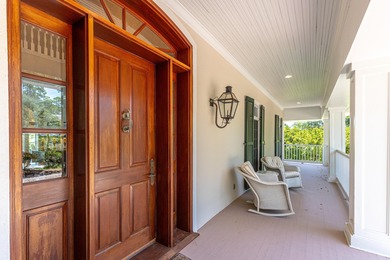 Timeless elegance on the bay behind the gates of prestigious