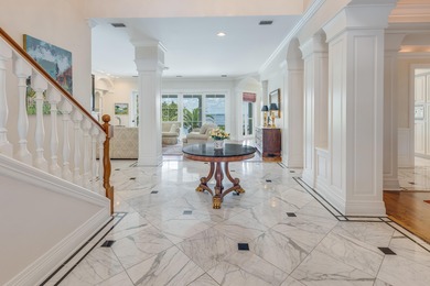 Timeless elegance on the bay behind the gates of prestigious