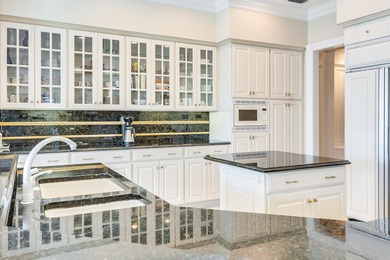 Timeless elegance on the bay behind the gates of prestigious