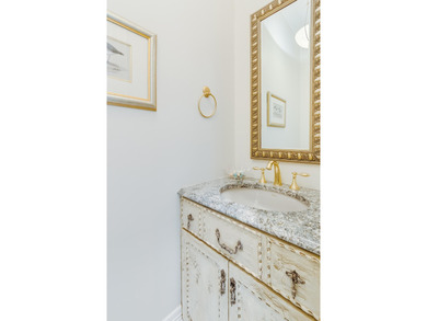 Timeless elegance on the bay behind the gates of prestigious