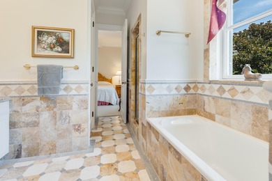 Timeless elegance on the bay behind the gates of prestigious