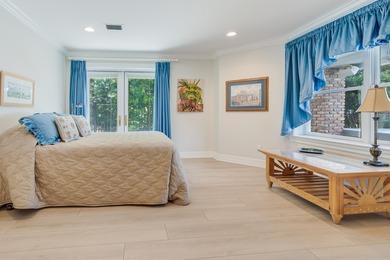 Timeless elegance on the bay behind the gates of prestigious