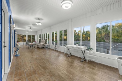 Elegant Spacious living with a fabulous Sunroom overlooking the