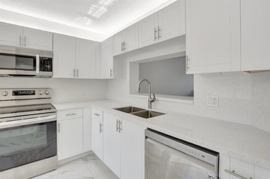 Stunning, fully remodeled condo with lake view--where no detail