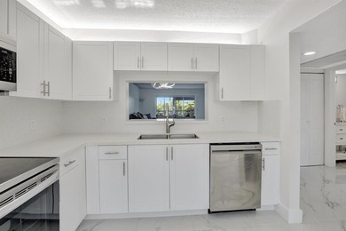 Stunning, fully remodeled condo with lake view--where no detail