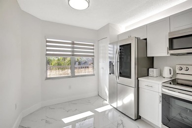 Stunning, fully remodeled condo with lake view--where no detail