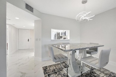 Stunning, fully remodeled condo with lake view--where no detail