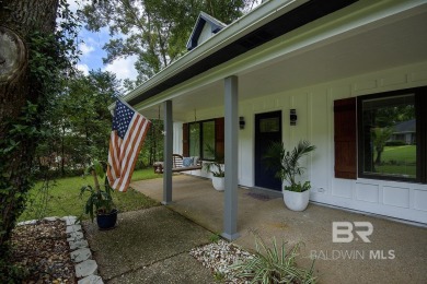 Located just one mile from downtown Fairhope, this 4BR/3.5BA