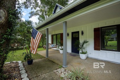 Located just one mile from downtown Fairhope, this 4BR/3.5BA