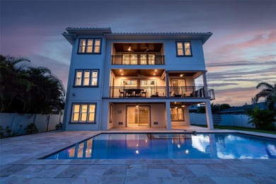 Built in 2021, this modern Mediterranean villa style home with