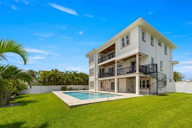 Built in 2021, this modern Mediterranean villa style home with