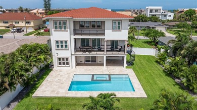 Built in 2021, this modern Mediterranean villa style home with